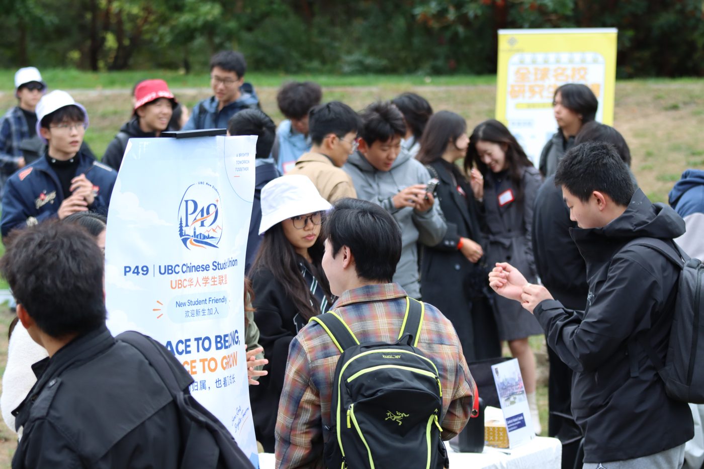Students chatting at the P49 booth